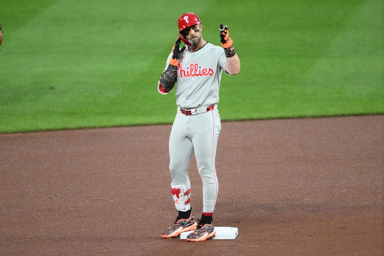 Bryce Harper wore his new camo cleats in games against the Los Angeles Dodgers and Baltimore Orioles.