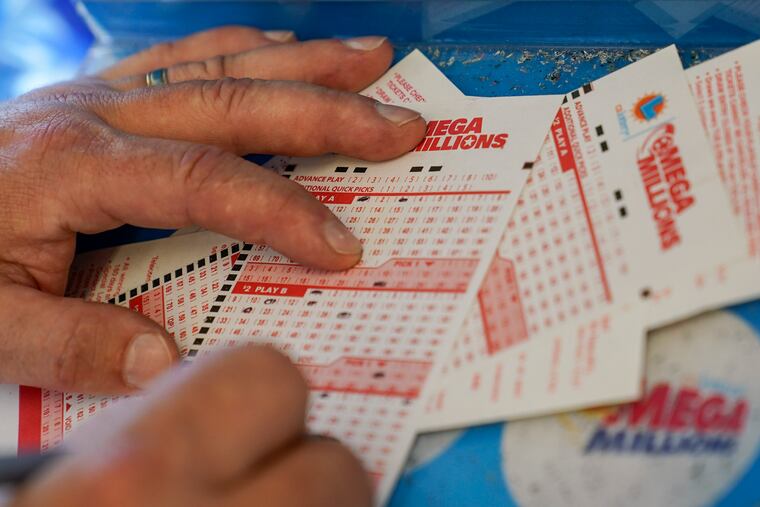 A person fills out a lottery ticket inside a 7-Eleven store in Oakland, Calif., earlier this week.