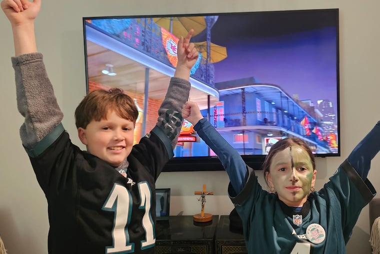 Sam Salvo, left, and his sister Marina celebrate the Eagles' Super Bowl victory last year.
