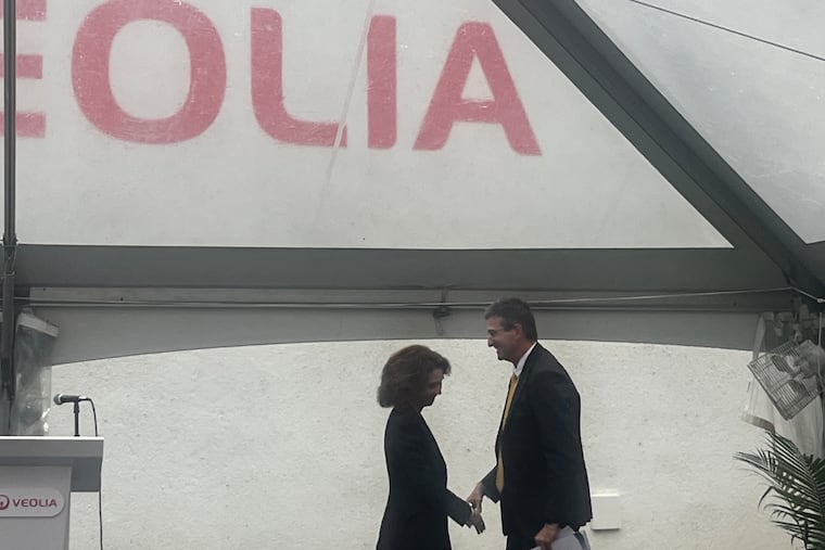 Veolia chief executive Estelle Brachlianoff greets Delaware Gov. Matt Meyer after her remarks at Veolia's new PFAS removal facility in Stanton, Del., on June 19, 2025.