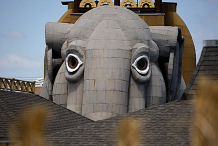 Lucy appears to peer out between two buildings near the beach in Margate. (David Maialetti / Staff photographer)