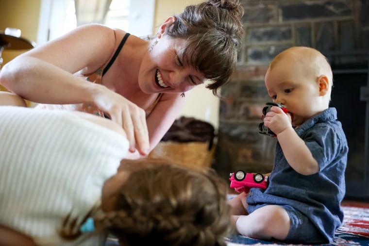 Katie Corr plays with her children, Maggie and Oliver, at her home on Wednesday, May 20, 2026, in Haverford.