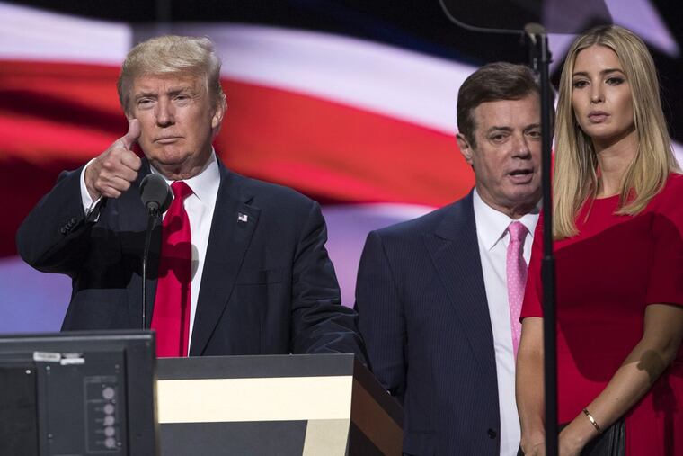 Campaign manager Paul Manafort, center, was at candidate Donald Trump’s side during the Republican National Convention.
