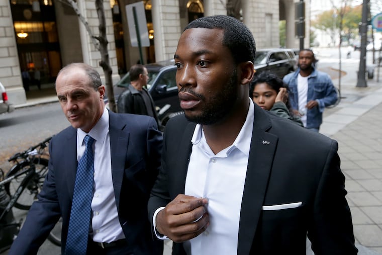 Rapper Meek Mill, right, arrives at the Criminal Justice Center with his lawyer, Brian McMonagle, on Nov. 6, 2017.