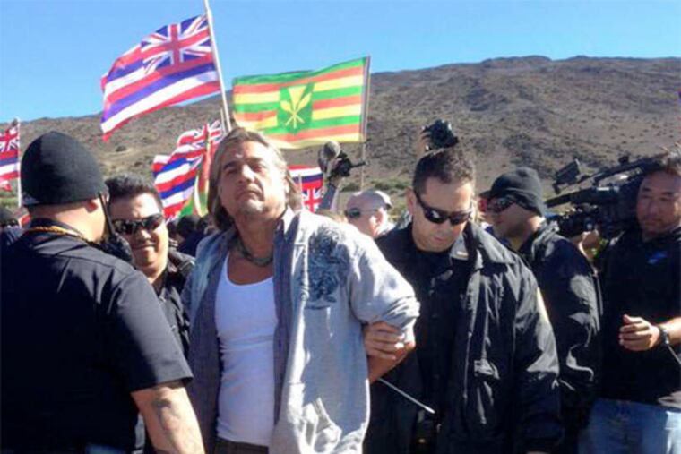 During a confrontation last month, a man was arrested for blocking the road to Mauna Kea.