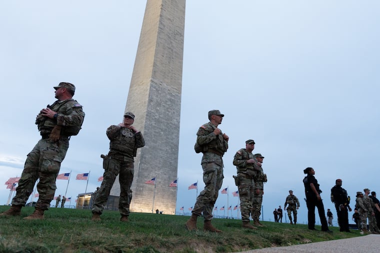 National Guard personnel, Secret Service and U.S. Park Police on the National Mall on July Fourth.