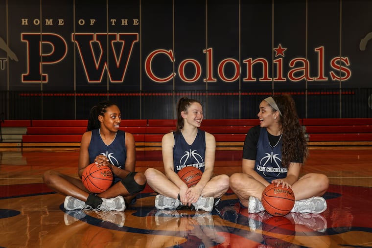 Plymouth Whitemarsh seniors Lainey Allen, left, who will attend Maryland Eastern Shore, Kaitlyn Flanagan, center, who will attend Holy Cross and Jordyn Thomas, who signed with Division II Thomas Jefferson, Tuesday, March 22, 2022.