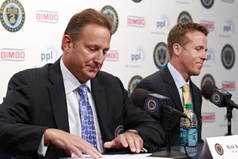 Union CEO Nick Sakiewicz (left) named John Hackworth the interim team manager in June. (Yong Kim/Staff Photographer)