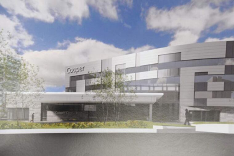 The four-story, 103,000-square-foot building, across from Cooper University Hospital, will provide a full range of specialists and services. CLEM MURRAY / Staff Photographer