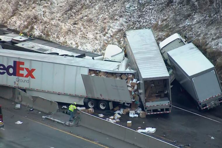 This image from video provided by KDKA TV shows the scene near Greensburg, Pa. along the Pennsylvania Turnpike where at least five people were killed and dozens were injured in a crash early Sunday that involved multiple vehicles, a transportation official said.