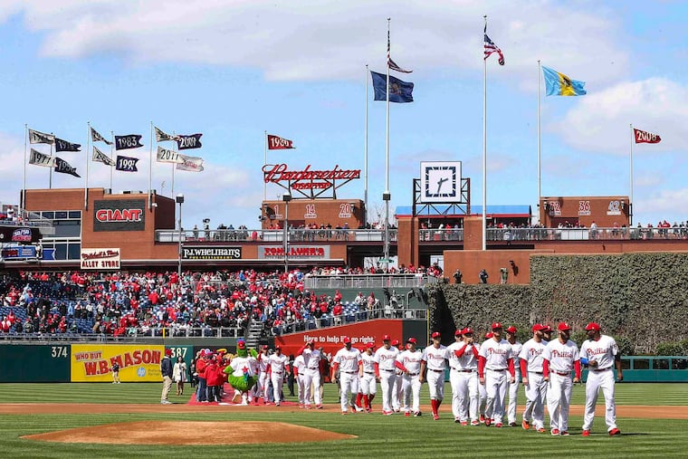 The clock in center field at Citizens Bank Park has been replaced by signage for next summer's MLB All-Star Game in Philadelphia.