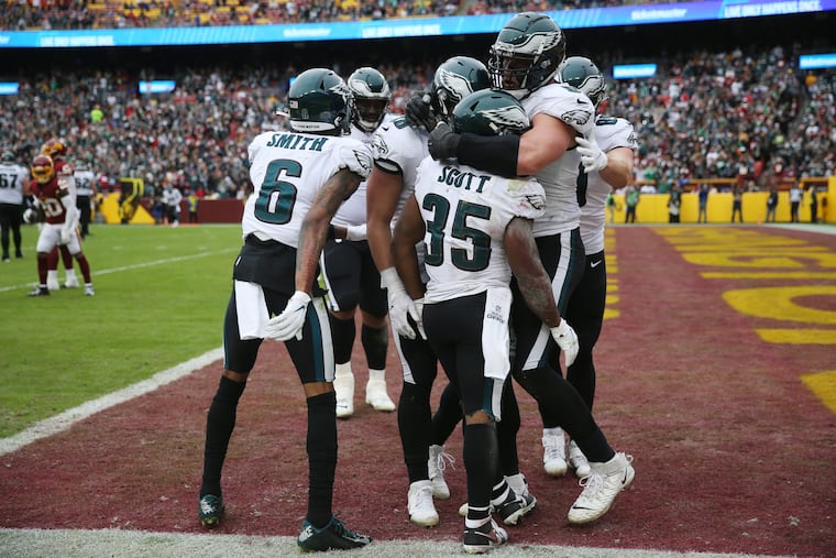 Philadelphia Eagles running back Boston Scott (35) celebrates his third-quarter touchdown Sunday, January 2, 2022 at FedEx Field in Landover, Maryland.