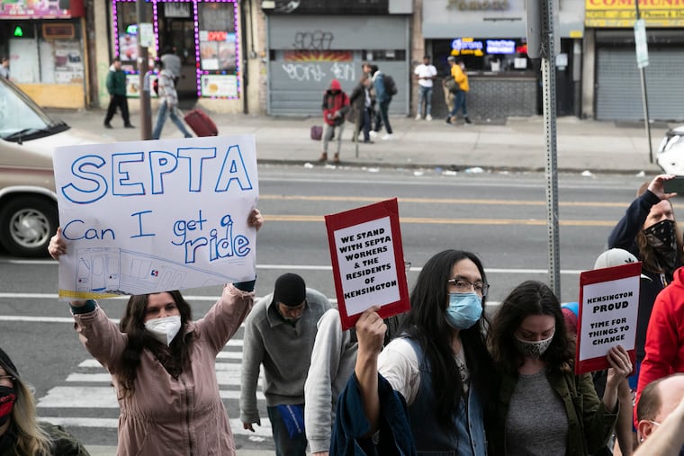 A group gathers outside of the Allegheny Station on the Market-Frankford El after march to protest to closing of the Somerset station. Residents called the Somerset station a lifeline to get around the city.