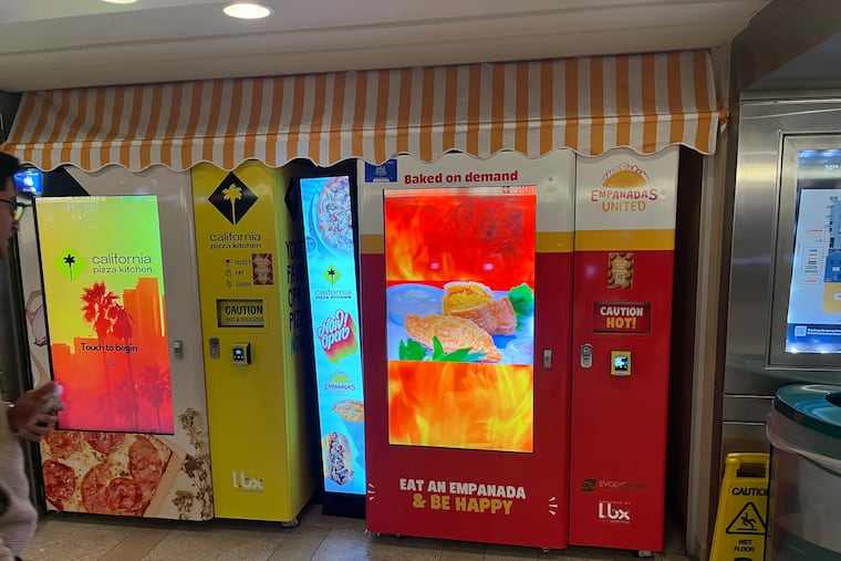 The Empanadas United machine sits next to a California Pizza Kitchen machine at 30th Street Station.