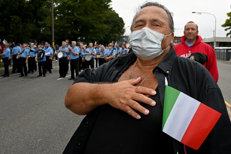 Domenic Giancaterino of South Philadelphia, and Cherry Hill, stands for the national anthem.