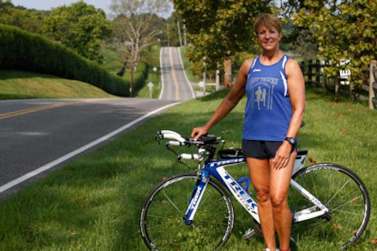 Candace Gantt, a triathlete, returns to the spot on Goshen Road, Newtown Square, where she was hit by a truck while cycling in 2005. MICHAEL S. WIRTZ / Staff Photographer