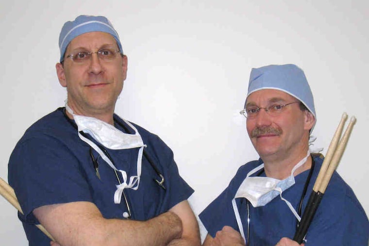 Two of the Rockin' Docs - Abington Hospital's Jeremy Jaffe (left) and Ken Einhorn - performing at the Electric Factory Sunday.