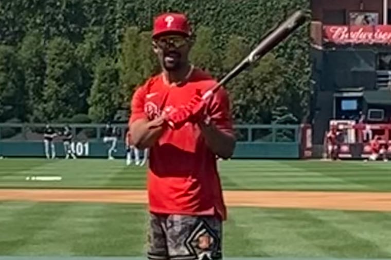 Eagles quarterback Jalen Hurts at Phillies batting practice on Tuesday