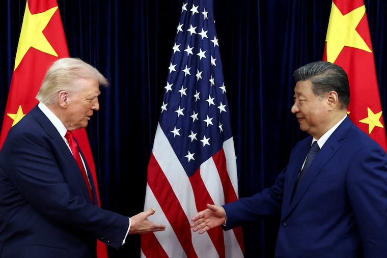 President Donald Trump and Chinese President Xi Jinping met Oct. 30 in Busan, South Korea. A planned meeting in Beijing may be postponed because of the Iran war.