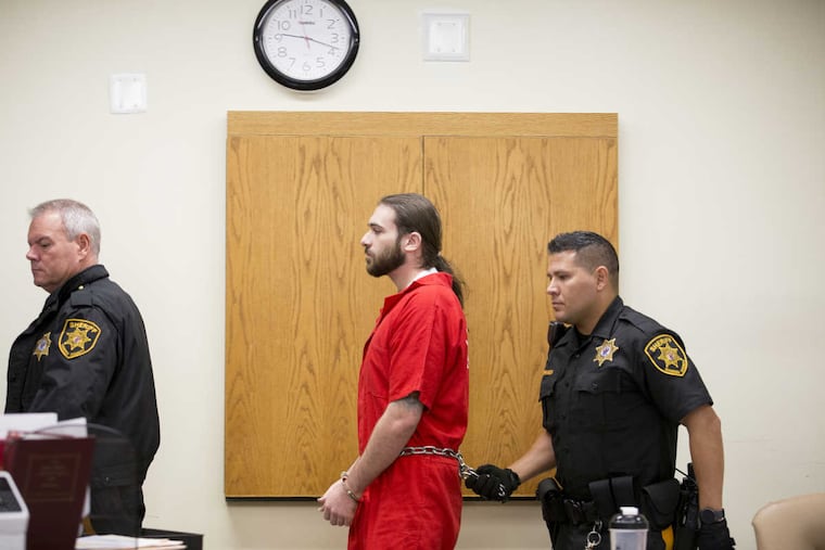 David Creato Jr. (center) exits Camden County Superior Court, Monday, Oct. 3, 2016, in Camden, New Jersey. Creato is charged in the death of his 3-year-old son Brendan.