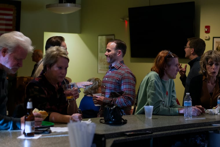 Bob Healey (center), a Republican candidate for the 3rd Congressional District, chats with supporters at VFW Post 3020 Thursday, Oct. 20, 2022 in Delran, NJ.