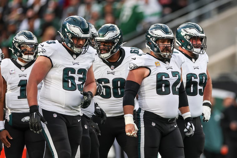 Eagles center Jason Kelce (62) leads the offensive line onto the field against the New York Jets on Oct. 15.