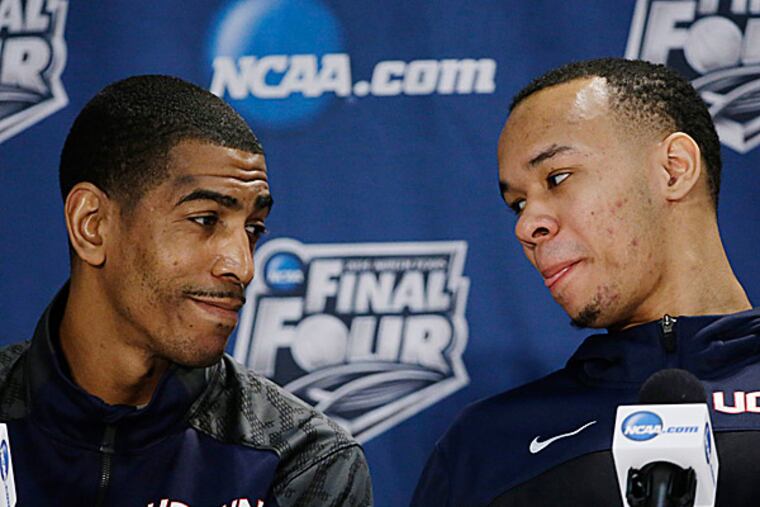 Connecticut forward Kentan Facey and guard Shabazz Napier. (David J. Phillip/AP)