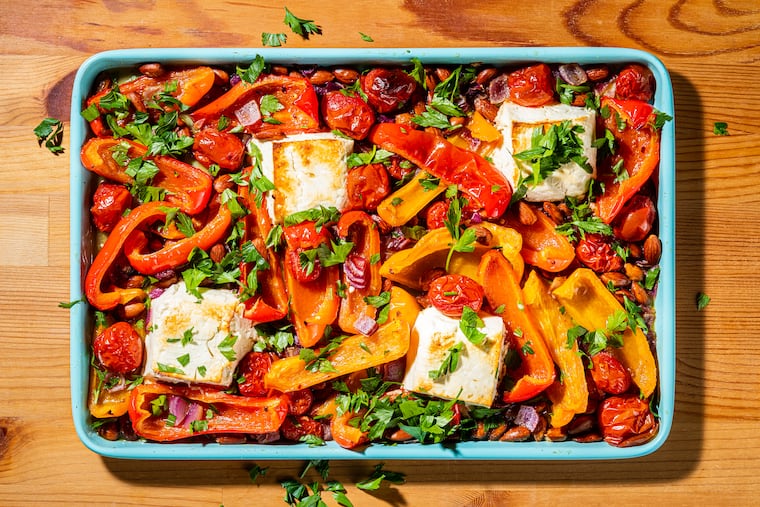 Romesco-Inspired Sheet Pan Feta With Peppers and Tomatoes. Photo for The Washington Post by Rey Lopez