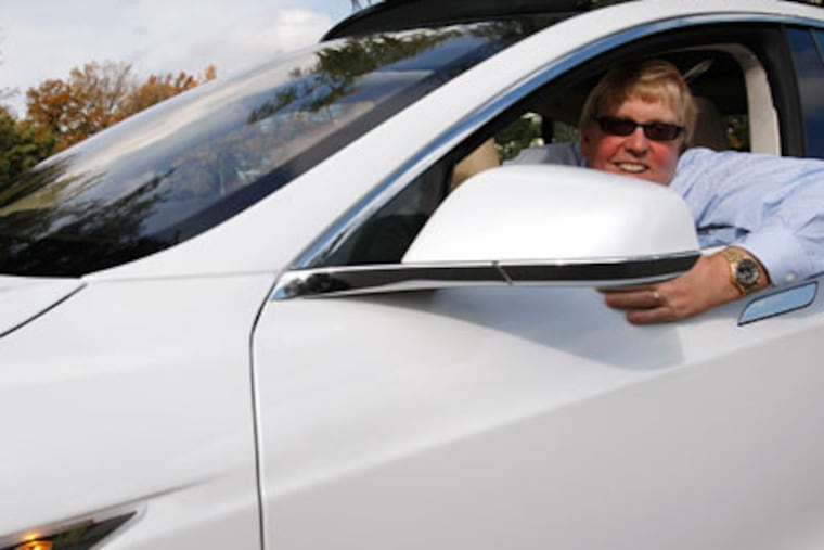 Peter Spirgel, an attorney with Flaster/Greenberg, behind the wheel of his new electric car, a Tesla Model S performance model. November 12, 2012. ( Michael S. Wirtz / Staff Photographer )
