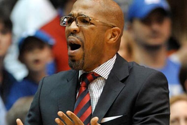 Penn head coach Jerome Allen and assistant coach Dan Leibovitz are lifelong friends. (AP)