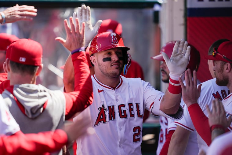 Los Angeles Angels designated hitter Mike Trout celebrates in the dugout after hitting a home run against the Baltimore Orioles in April.