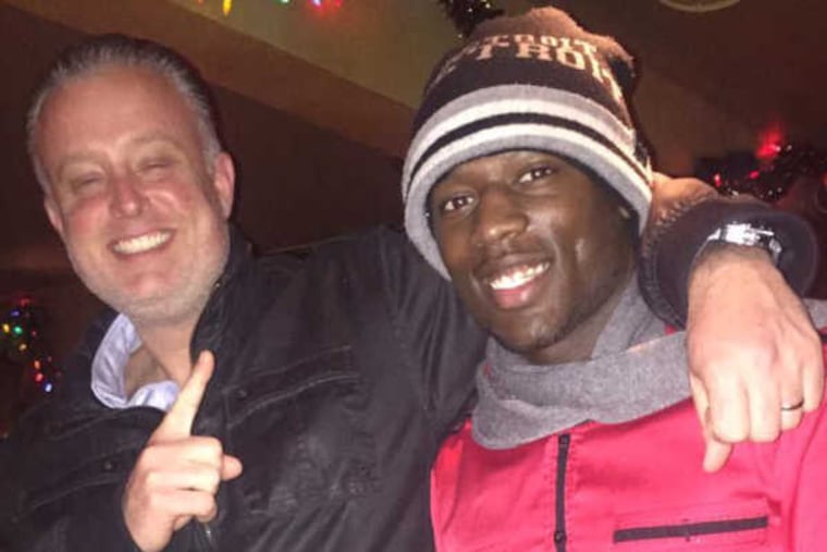 Fight promoter Jimmy Binns Jr. (left) with boxer Kevin “Thunderstorm” Johnson.