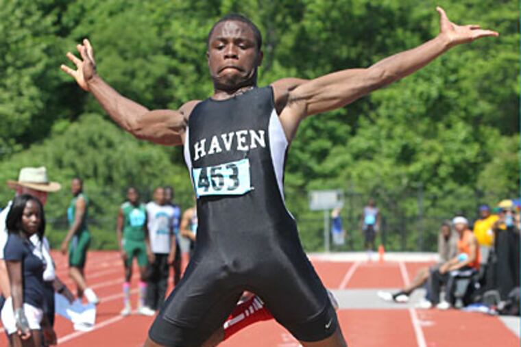 Strath Haven's Wellington Zaza recorded 49-8 to win the Class AAA boys' triple jump. (Charles Fox/Staff Photographer)