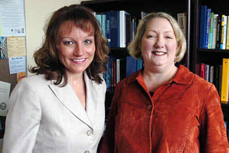 Shannon Finning (left) and Melissa M. Englund support Drexel's veterans office. (Clem Murray / Staff)