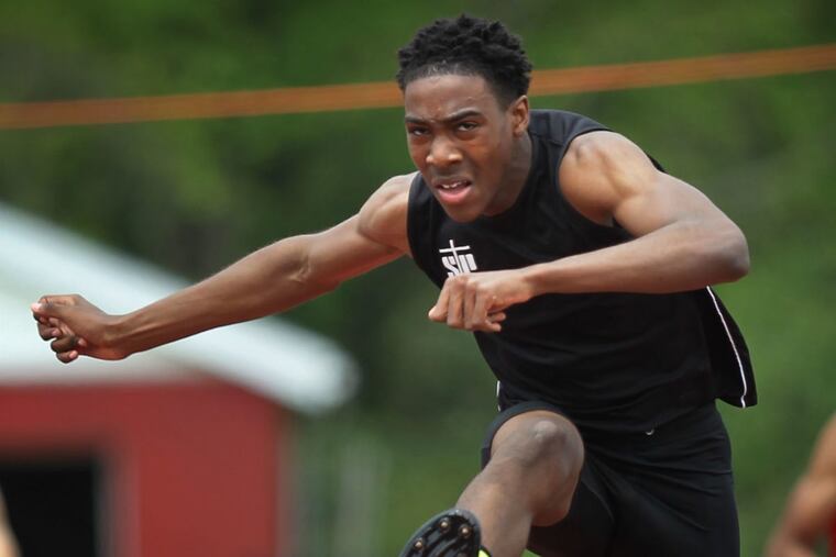 St. Joseph’s Prep’s Miles Green competes in the 300-meter hurdles at the Catholic League track and field championships last May.