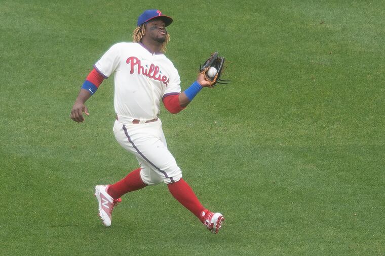 Odubel Herrera is off the Phillies roster while MLB conducts an investigation into the assault charge.