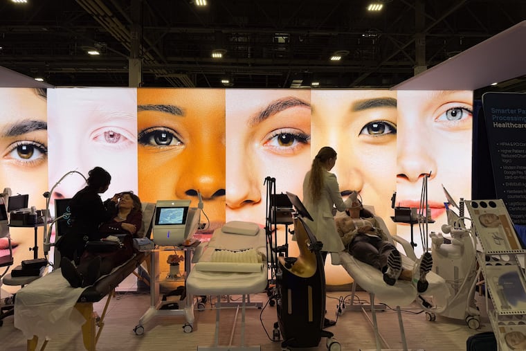 In Las Vegas, people at an annual gathering of the longevity industry called LongevityFest test out products on Dec. 13. MUST CREDIT: Trisha Thadani/The Washington Post