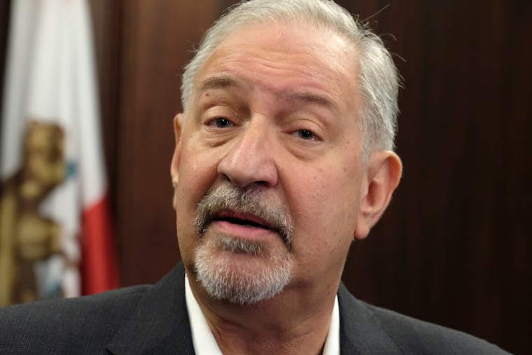 File - This Friday, Sept. 2, 2016 file photo shows attorney Mark Geragos talking to the media during a news conference in downtown Los Angeles. CNN has cut ties with Mark Geragos just hours after the celebrity attorney was named as a co-conspirator in a case accusing lawyer Michael Avenatti of trying to extort Nike. A CNN representative confirmed Monday, March 25, 2019, that Geragos is no longer a contributor to the network but didn't specify why. His name is no longer listed on CNN's website as a legal analyst.
