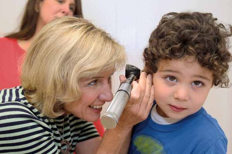 Dr. Theresa Welsh examines Jake Hernandez, 5, ofCherry Hill, NJ at her office in Haddonfield Pediatric Associate with his mom Christa Hernandez in background.
(AKIRA SUWA / Staff Photographer)
theresa welsh, a haddonfield peditrician, 55, has decided to donate a kidney to a stranger. Why and how she came to this decision, the reaction of her family, and the ins and outs of transplant will all be in this story/profile. The surgery is scheduled for Oct. 22