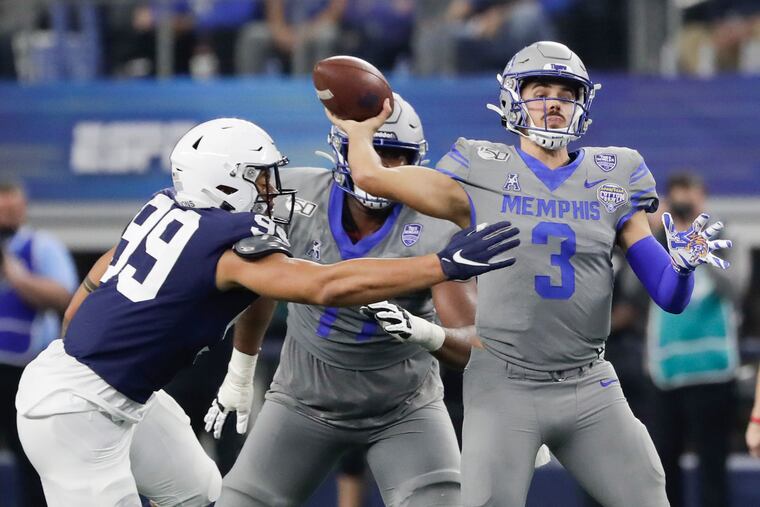 Penn State defensive end Yetur Gross-Matos goes after Memphis quarterback Brady White in the Cotton Bowl on Saturday, December 28, 2019 in Arlington, Texas.