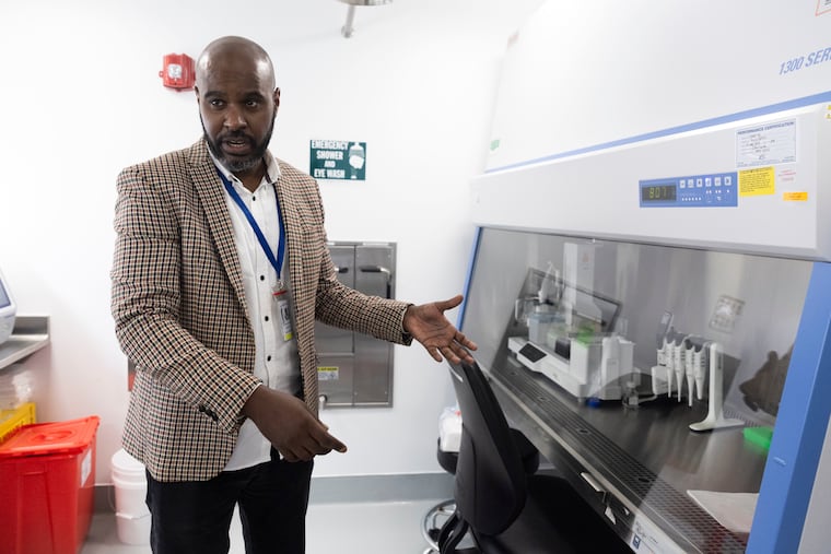 Mazen Sid Ahmed, a molecular microbiology scientist, talks about the machines used for wastewater testing at Philadelphia's Public Health Laboratory on Thursday, July 18, 2024.