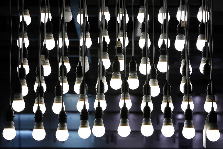 Compact fluorescent bulbs are displayed at an Ikea store in Philadelphia, Tuesday, June 15, 2010. (AP Photo/Matt Rourke)