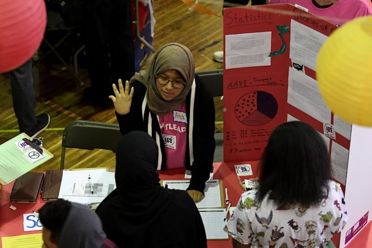 Ana Canochola, facing, educates and informs on anti-deportation movements among Asian people. resources. They grapple with the Trump administrationÕs ever-greater immigration enforcement. JOSE F. MORENO / Staff Photographer