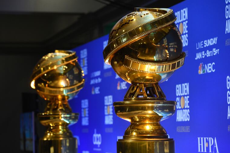 FILE - This Dec. 9, 2019 file photo shows replicas of Golden Globe statues at the nominations for the 77th annual Golden Globe Awards in Beverly Hills, Calif. The 77th annual Golden Globe Awards will be held on Sunday, Jan. 5.