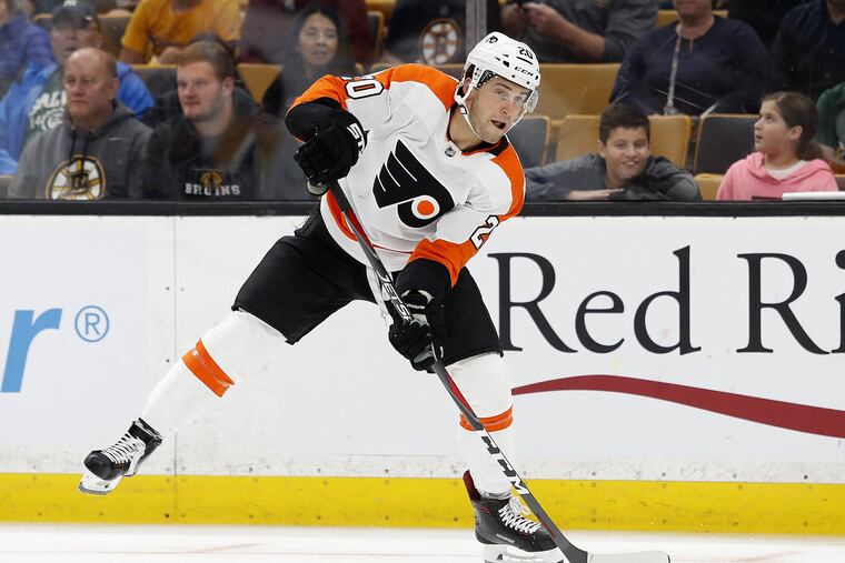 Taylor Leier controls the puck during Saturday's preseason game in Boston. He scored a goal in the game as the Flyers won, 4-1.