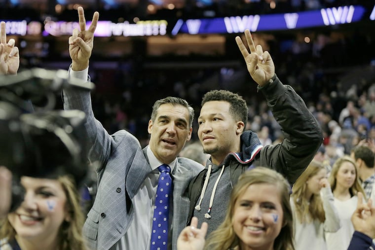Villanova coach Jay Wright pulled former Villanova basketball player Jalen Brunson onto the court for a college cheer after the Georgetown vs. Villanova University NCAA mens basketball game at Wells Fargo Center in Phila., Pa.on February 3, 2019.