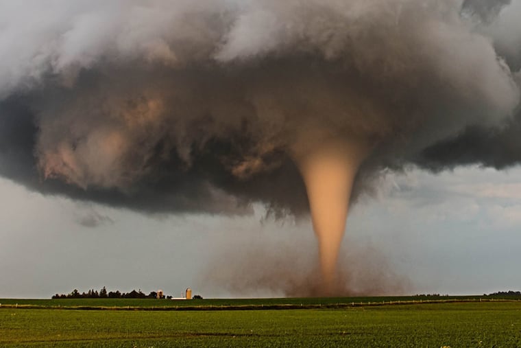 A twister captured on camera at sunset.
