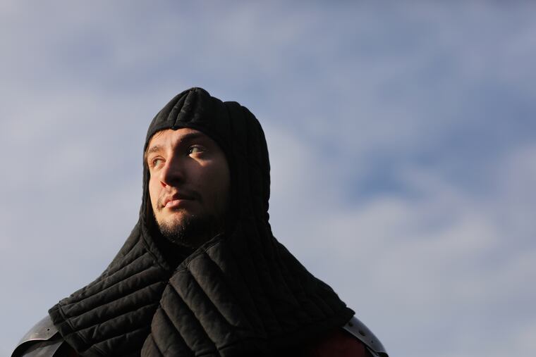 Logan Greer assembles his 15th Century Italian knight kit, practicing for his Armored Combat League battle on Friday and Saturday.