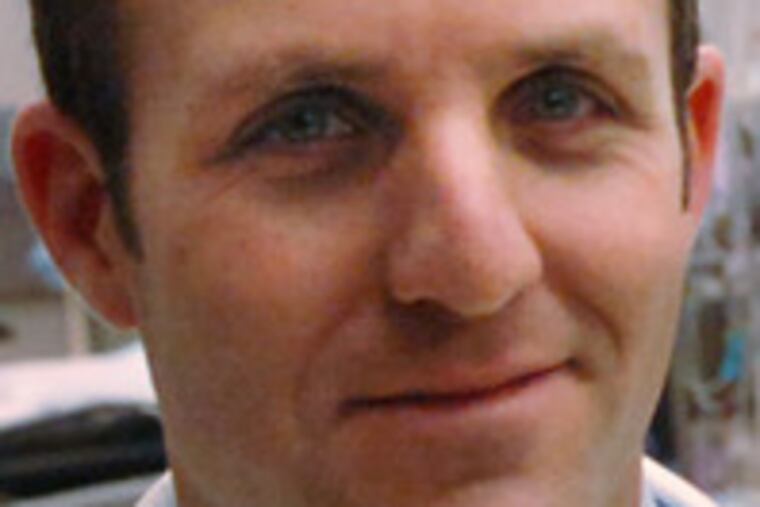 Physician Roger Band is "happy to donate" his time to Clinton.