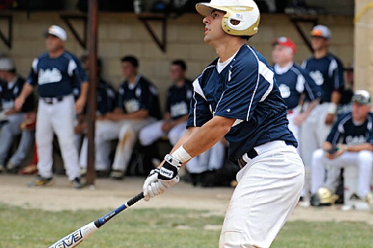 Catholic League catcher Ray Toto, junior from St. Joe's Prep, watches his two-run homer clear the in the bottom of the 4th inning. (Clem Murray / Staff Photographer)